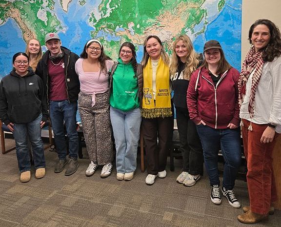 Casey and Gulzat with University of Idaho students